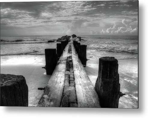 Folly Beach Pilings Metal Print featuring the photograph Folly Beach Pilings Charleston South Carolina In Black and White by Carol Montoya