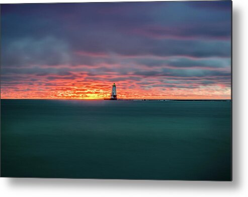 Ludington Mi Metal Print featuring the photograph Glowing Sunset on Lake With Lighthouse by Lester Plank