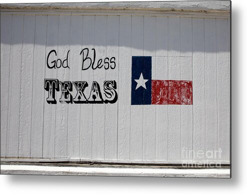 God Bless Texas Metal Print featuring the photograph God Bless Texas with Texas Flag painted on the side of a building by Dan Herron