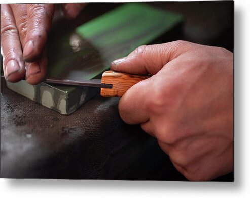 Forged In Fire Metal Print featuring the photograph Honing the Blade 4 by Jean Gill