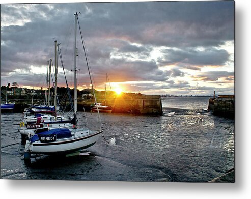 Sunset Metal Print featuring the photograph In the rays of the setting sun. by Elena Perelman