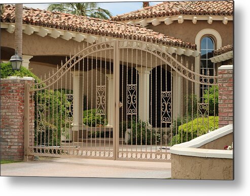 Iron Gate Metal Print featuring the photograph Iron Gate in Front of Desert Home by Colleen Cornelius