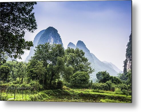 Karst Metal Print featuring the photograph Karst rural scenery in spring by Carl Ning
