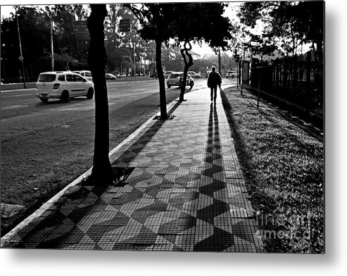 Sidewalk Metal Print featuring the photograph Lonely Man Walking at Dusk in Sao Paulo by Carlos Alkmin