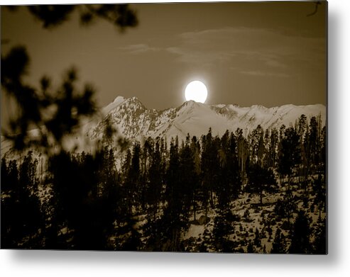 Moonset Metal Print featuring the photograph moonset over the Rockies by Stephen Holst