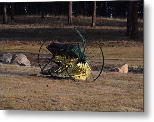 Green Metal Print featuring the photograph Old Farm Implement Lake George CO #1 by Margarethe Binkley
