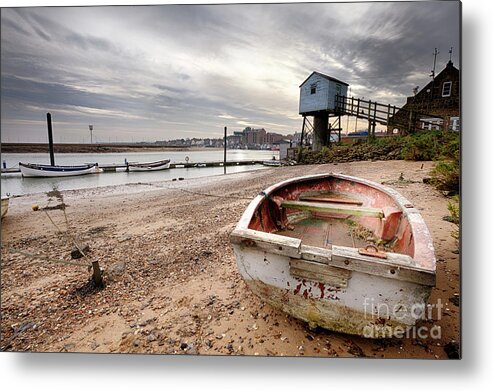 Norfolk Metal Print featuring the photograph Old rowing boat and lookout tower on beach by Simon Bratt