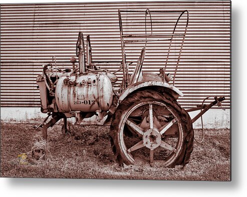 Hawaii Metal Print featuring the photograph Old Tractor Against Quonset Hut by Jim Thompson