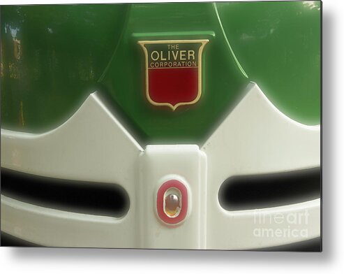 Tractor Metal Print featuring the photograph Oliver Tractor Emblem by Mike Eingle