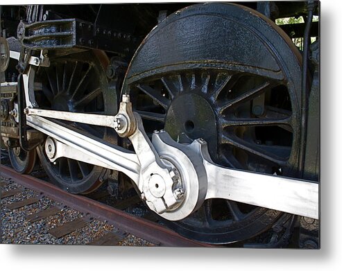 Black Metal Print featuring the photograph Retired Wheels by Todd Kreuter