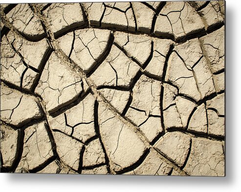 Crack Metal Print featuring the photograph River Mud by Jeff Phillippi