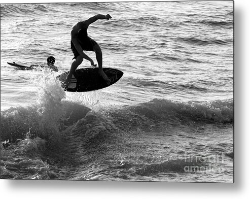 Surf Metal Print featuring the photograph Skim Boarder Gets Air by Robert Wilder Jr
