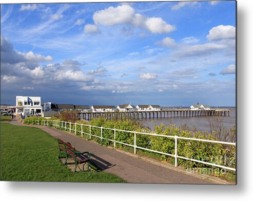 Southwold Pier Suffolk Uk England English Seaside Southwold Uk Water Towers Suffolk Uk British English England Britain Landscape Countryside Blue Sky Skies Clouds Holiday Resort Coast Coastal Metal Print featuring the photograph Southwold Pier Suffolk UK by Julia Gavin