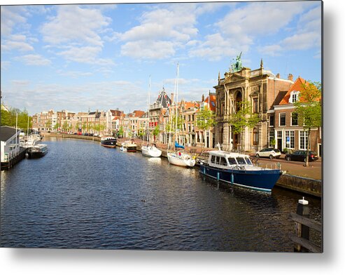 Haarlem Metal Print featuring the photograph Spaarne and Haarlem by Anastasy Yarmolovich