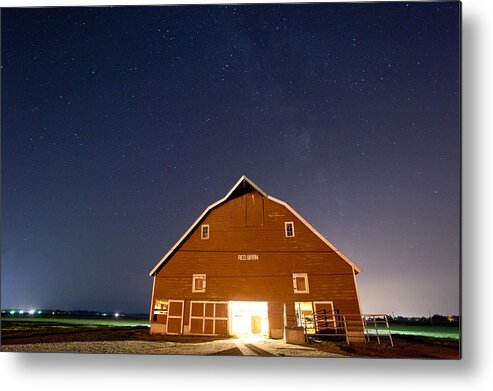 Red Barn Metal Print featuring the photograph Starry Sky over a red barn by Matt McDonald