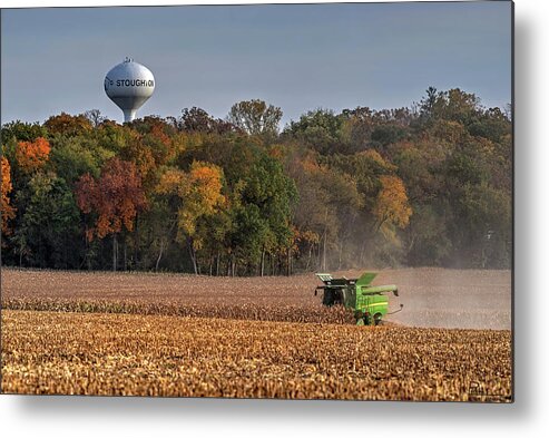 Corn Harvest John Deere Combine Water Tower Stoughton Wisconsin Wi Landscape Farming Rural Agriculture Autumn Fall Trees Yellow Gold Horizontal Metal Print featuring the photograph Stoughton WI Corn Harvest by Peter Herman