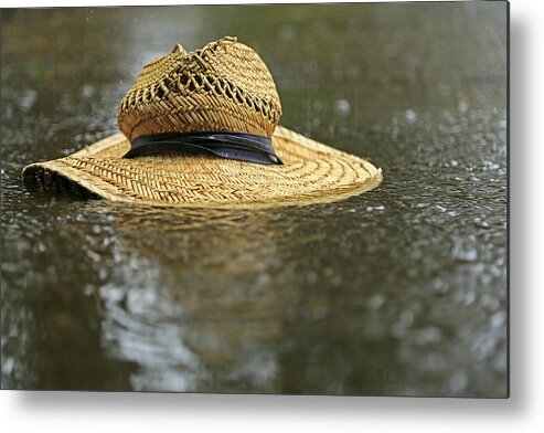 Sun Hat Metal Print featuring the photograph Sun hat in the rain by Bob Cournoyer