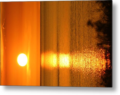 Orange Metal Print featuring the photograph Sunset over water by Anita Parker