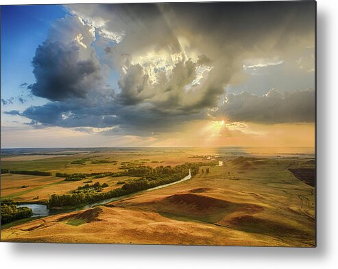 Hilltop Metal Print featuring the photograph Sunset Through the Rain Clouds by John Williams
