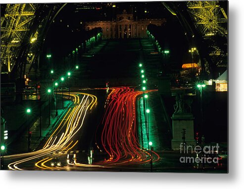 Motion Metal Print featuring the photograph Tail lights at feet of Eiffel Tower by night by Sami Sarkis