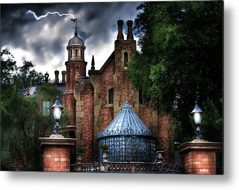 Magic Kingdom Metal Print featuring the photograph The Haunted Mansion by Mark Andrew Thomas