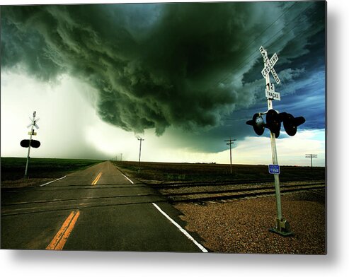 Weather Metal Print featuring the photograph The Rough Road Ahead by Brian Gustafson