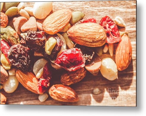 Almond Metal Print featuring the photograph Trail mix high-energy snack food background by Jorgo Photography
