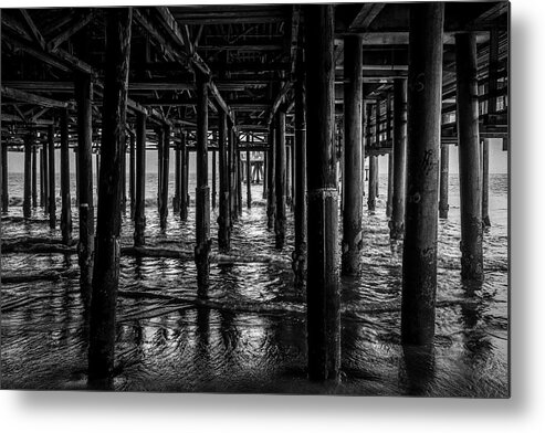 Under The Pier Metal Print featuring the photograph Under The Pier - Black And White by Gene Parks