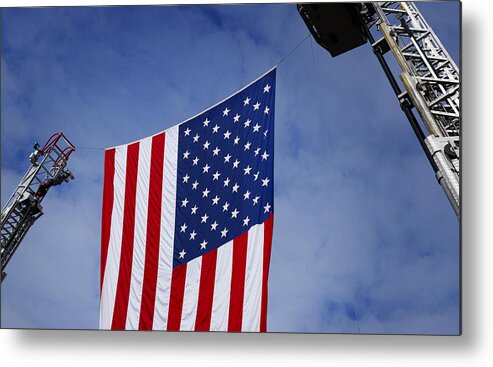  Flag Metal Print featuring the photograph United States Flag Between Fire Ladders by Phil Cardamone