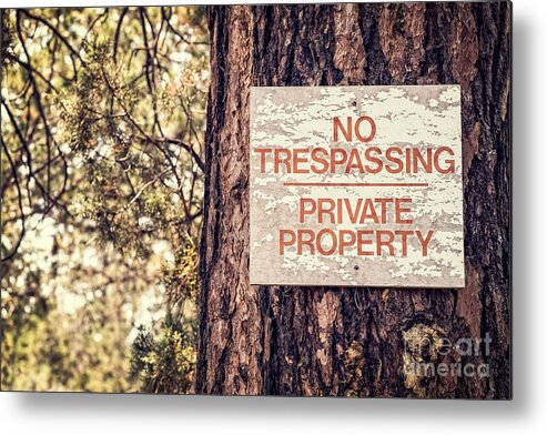 Forest Metal Print featuring the photograph Weathered No Trespassing Sign on Tree by Bryan Mullennix