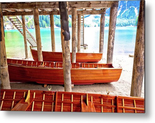 Prags Metal Print featuring the photograph Wooden boats under boat house on Braies lake by Brch Photography