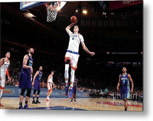 Kristaps Porzingis Metal Print featuring the photograph Charlotte Hornets V New York Knicks by Nathaniel S. Butler