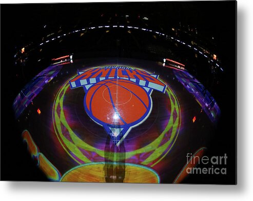 A Photo Of The New York Knicks Logo Before A Game Against The Sacramento Kings On December 4 Metal Print featuring the photograph Sacramento Kings V New York Knicks by Nathaniel S. Butler