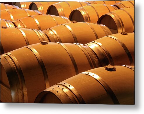 Fermenting Metal Print featuring the photograph Wine Barrels In Winery Cellar Of Napa #2 by Yinyang