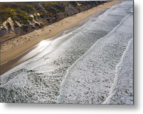 Landscapeaerial Metal Print featuring the photograph The Pacific Ocean Washes Onto A Beach #3 by Ethan Daniels