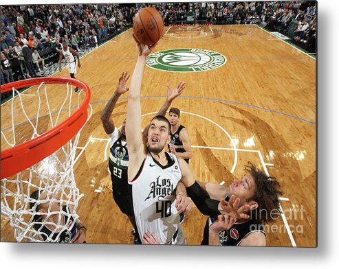 Ivica Zubac Metal Print featuring the photograph La Clippers V Milwaukee Bucks by Gary Dineen