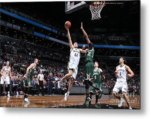 Nba Pro Basketball Metal Print featuring the photograph Milwaukee Bucks V Brooklyn Nets by Nathaniel S. Butler
