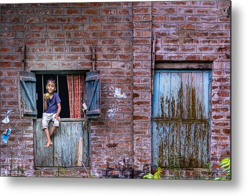 Child Metal Print featuring the photograph A Child Sitting On A Window by Md Sabbir