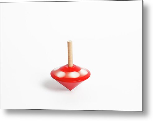 White Background Metal Print featuring the photograph A Childs Spinning Wooden Top by Diane Macdonald