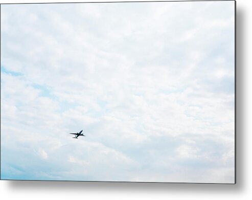 Moving Up Metal Print featuring the photograph An Air Plane Flying In The Sky by Kohei Hara