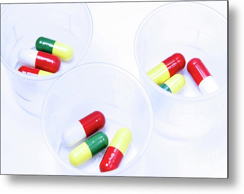 Beakers Metal Print featuring the photograph Assortment Of Capsules In Beakers by Cordelia Molloy/science Photo Library