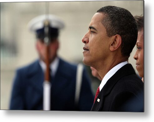 Looking Metal Print featuring the photograph Barack Obama Is Sworn In As 44th by John Moore