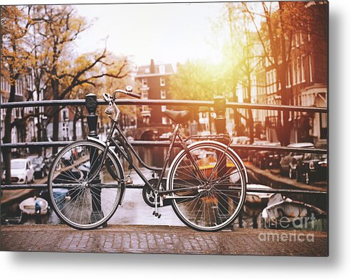 North Holland Metal Print featuring the photograph Bicycles Parked On A Bridge In Amsterdam by Serts