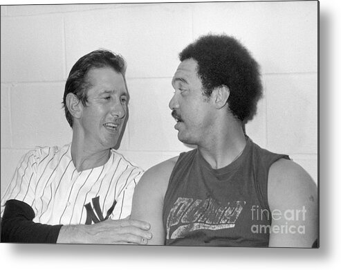 Mature Adult Metal Print featuring the photograph Billy Martin Talking With Reggie Jackson by Bettmann