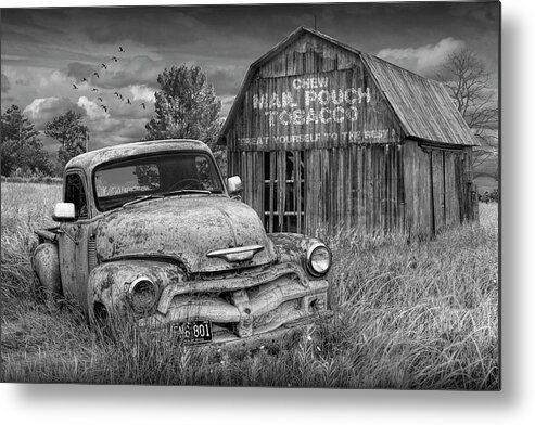 Chevy Metal Print featuring the photograph Black and White of Rusted Chevy Pickup Truck in a Rural Landscape by a Mail Pouch Tobacco Barn by Randall Nyhof