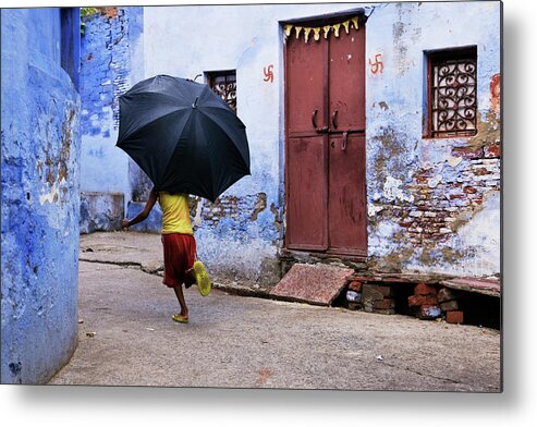 Child Metal Print featuring the photograph Boy Running In An Alley Holding An by Jeremy Woodhouse