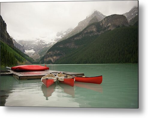 Tranquility Metal Print featuring the photograph Canoes On Lake Louise, Banff National by Fstop Images - Brian Caissie