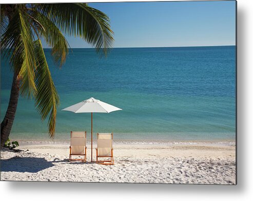 Tropical Tree Metal Print featuring the photograph Chair On Florida Keys Beach by Cdwheatley