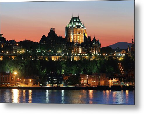 Water's Edge Metal Print featuring the photograph Chateau Frontenac In Old Quebec City At by Buzbuzzer