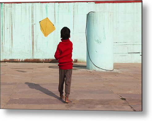 Child Metal Print featuring the photograph Child At Game by Jurij Bizjak